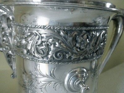 ANTIQUE SILVER PLATE TILTING ICE WATER PITCHER PRESENTED TO FLORA 