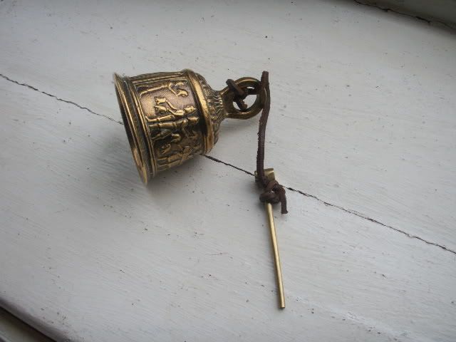 Old Brass Hand Bell Asyrian figures Ornate Figural Vintage hand bell 