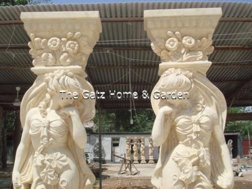 Description Carved figural columns in Egypt Beige marble. These 