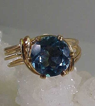 WIRE WRAPPED LAB CREATED AQUAMARINE RING   7.25   YGF  