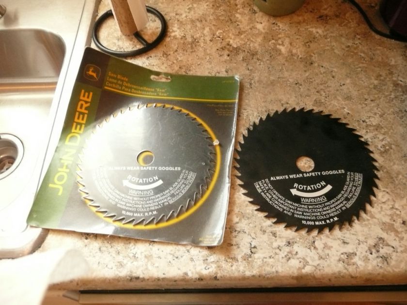 LOT OF TWO NEW JOHN DEERE SAW BLADES ONE SEALED  